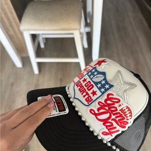 Black and White Sports Cap with Red and Silver Accents